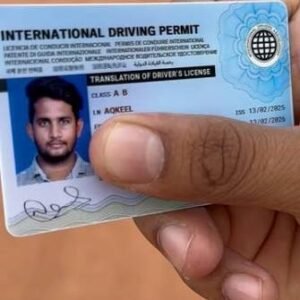 A tourist driving a rental car abroad legally with an International Driving Permit