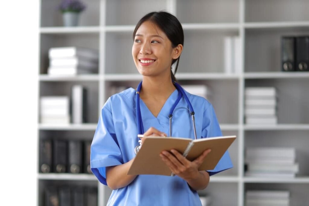 Nurse preparing for NCLEX exam with nursing study materials